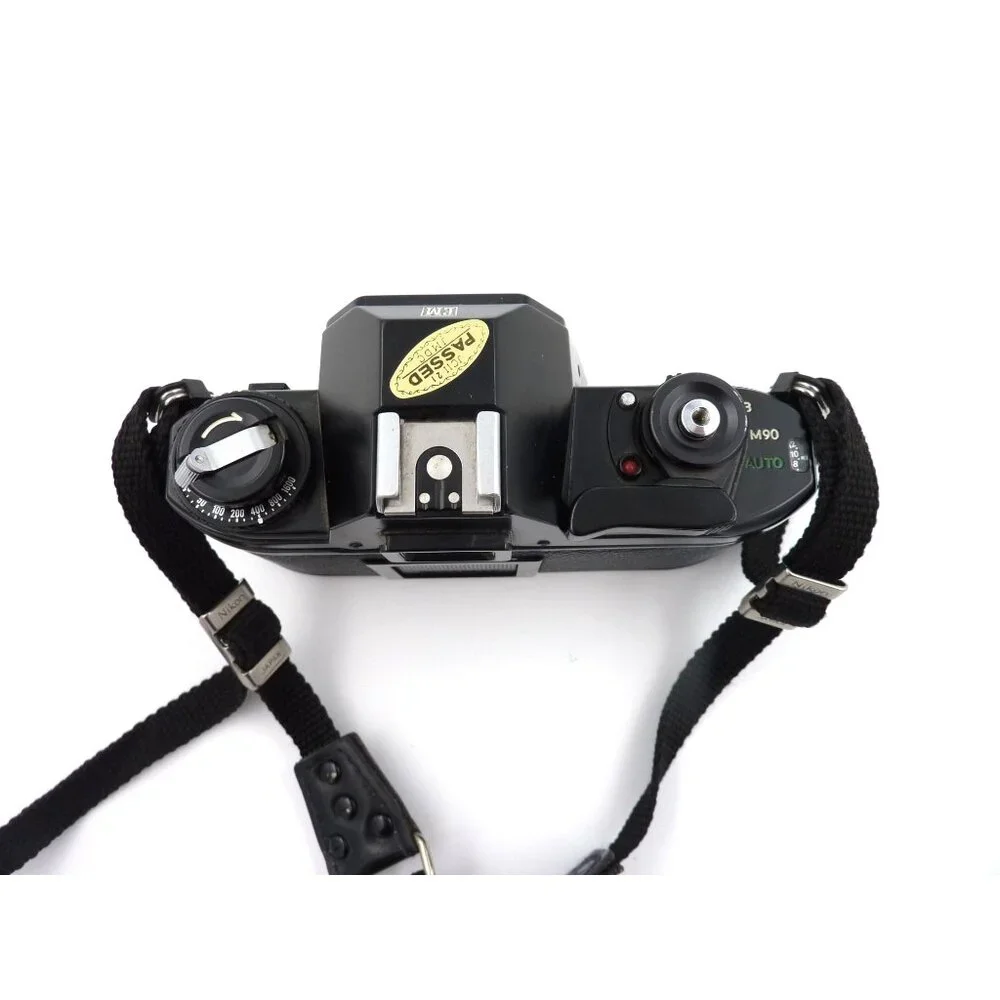 Nikon EM 35mm SLR Film Camera Body Only cam works light meter does not read